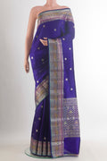 Blue Tussar Saree with Zari Butta on the body and Zari Border.  displayed on a mannequin
