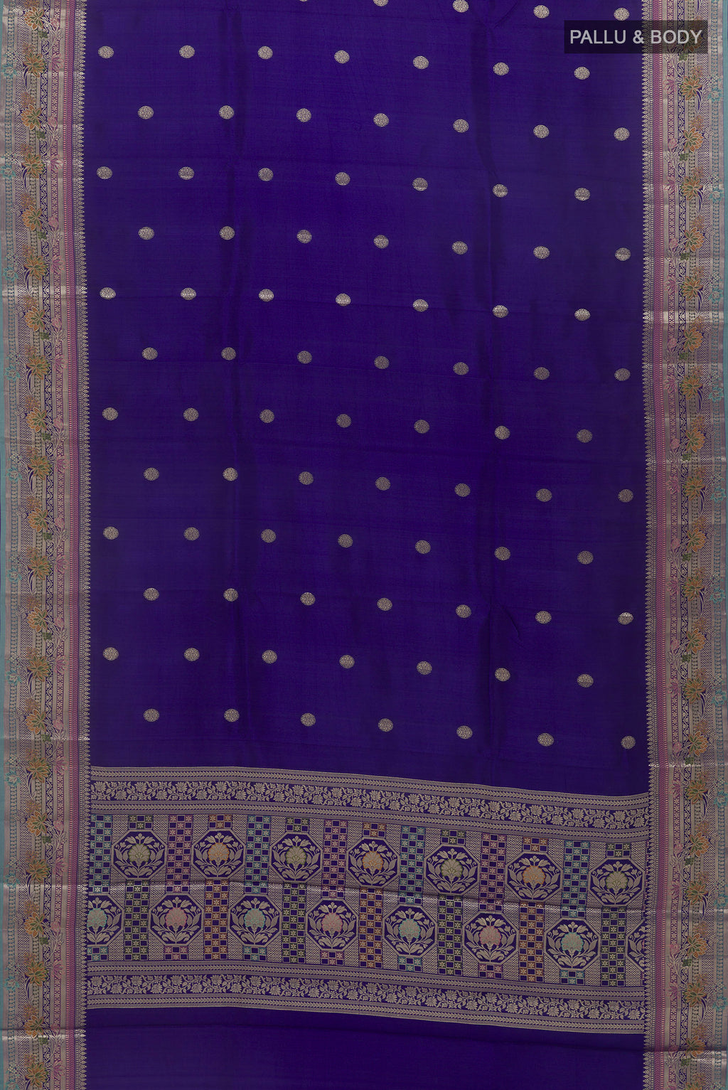 Flat view of Blue Tussar Saree with Zari Butta on the body and Zari Border. 
