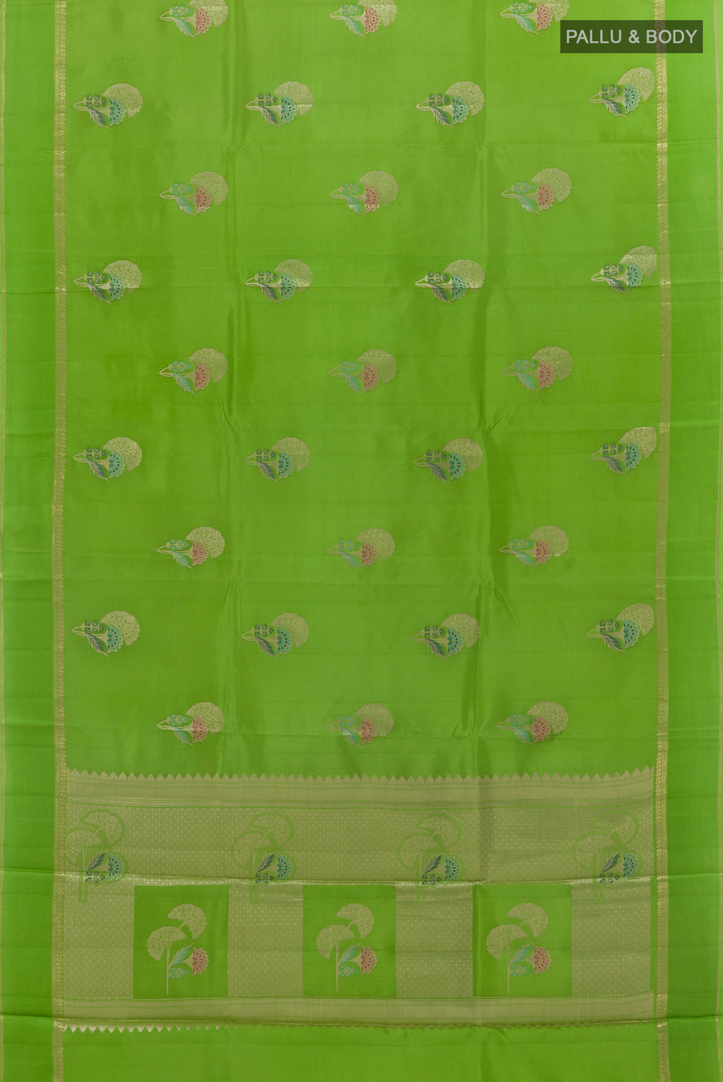 Flat view of Green Tussar Saree with Zari Butta on the body and Zari Border. 