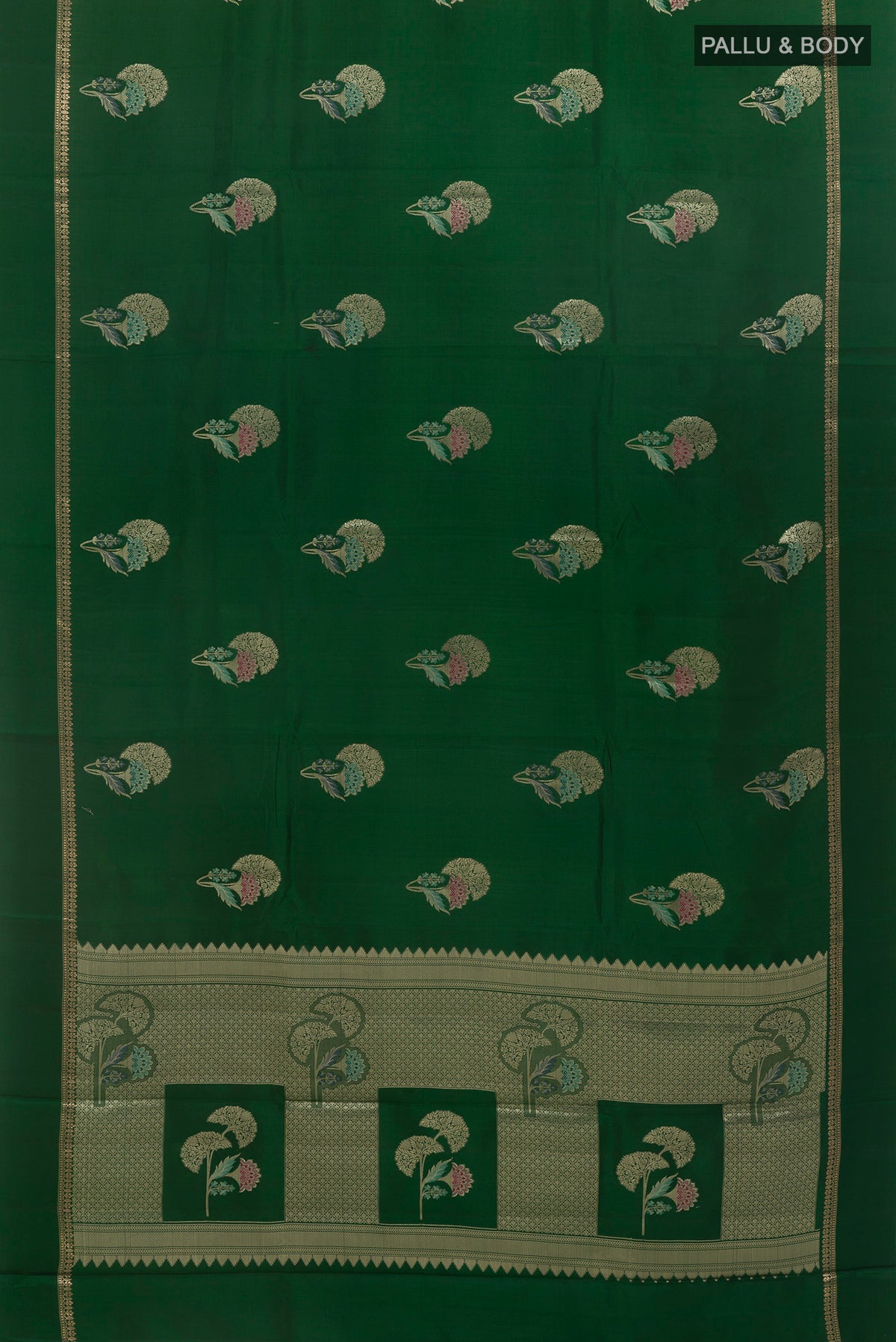Flat view of Bottle Green Tussar Saree with Zari Butta on the body and Zari Border. 