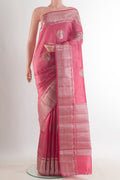 Pink Tussar Saree with Zari Butta on the body and Zari Border.  displayed on a mannequin