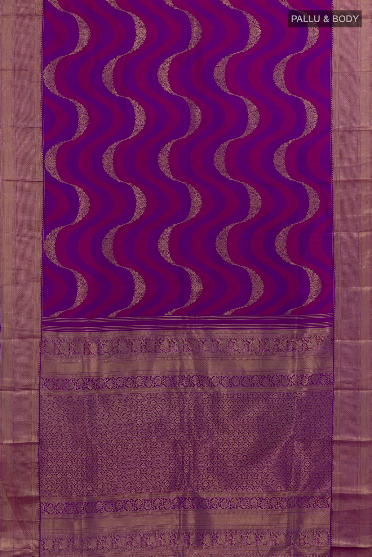 Flat view of Pure Silk Purple Kanchipuram Saree with Fancy on the body and Zari Border. 