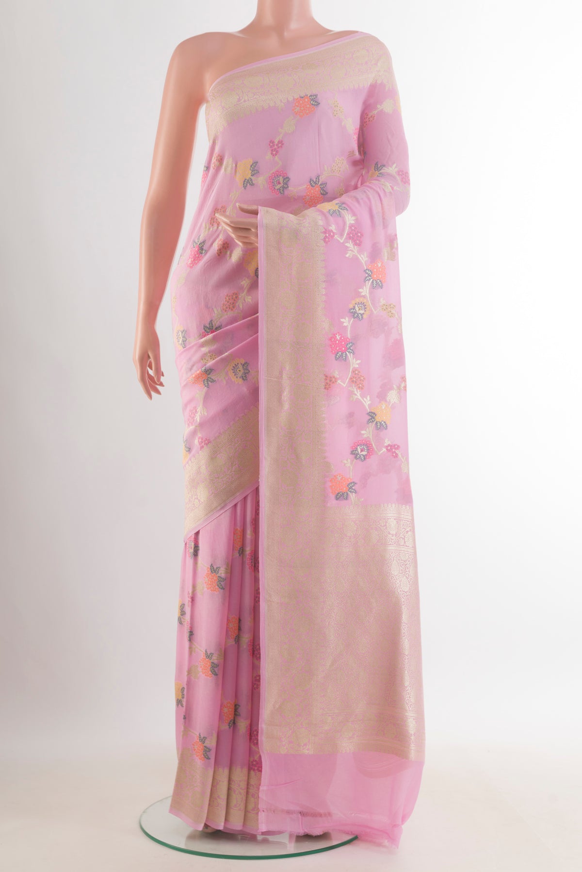 Rose pink Banarasi Georgette Saree with Zari Brocade on the body and Zari Border.  displayed on a mannequin