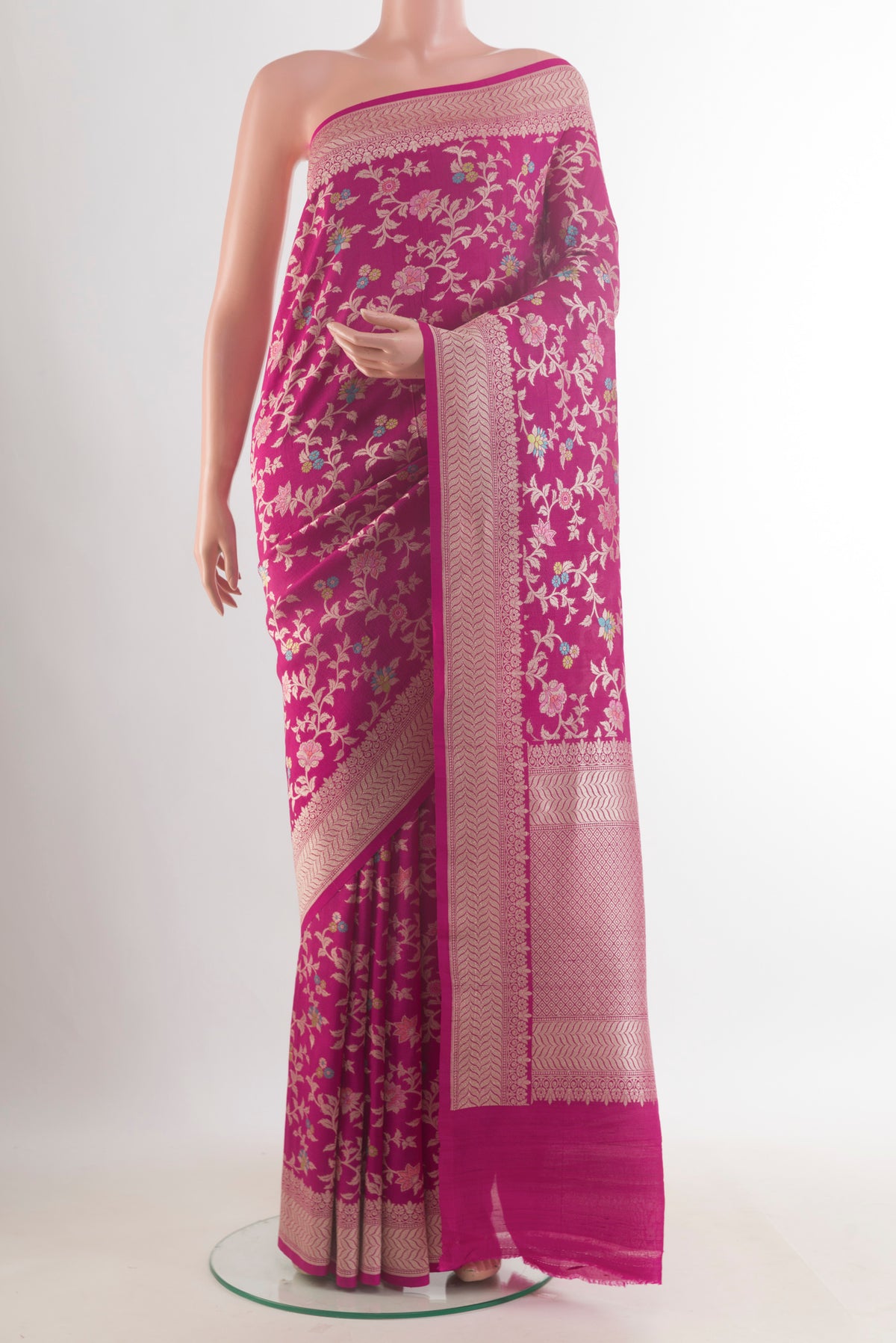 Rani Pink Banarasi Tussar Saree with Zari Brocade on the body and Zari Border.  displayed on a mannequin