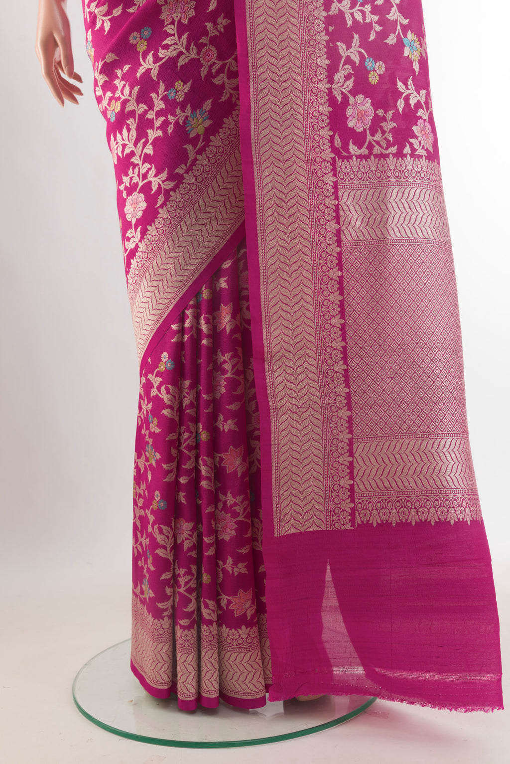 Pleats and pallu of Rani Pink Banarasi Tussar Saree with Zari Brocade on the body and Zari Border. 