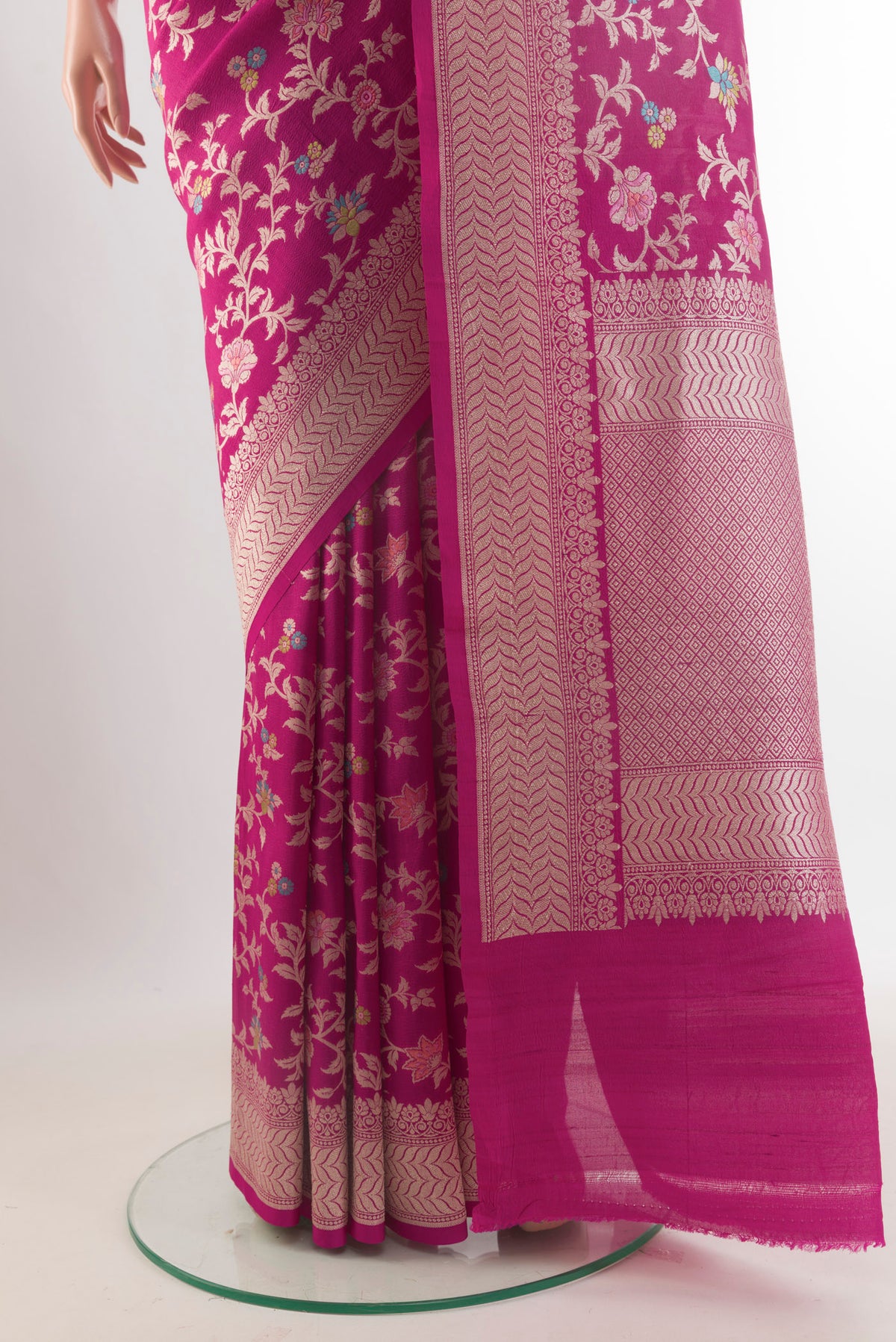 Pleats and pallu of Rani Pink Banarasi Tussar Saree with Zari Brocade on the body and Zari Border. 