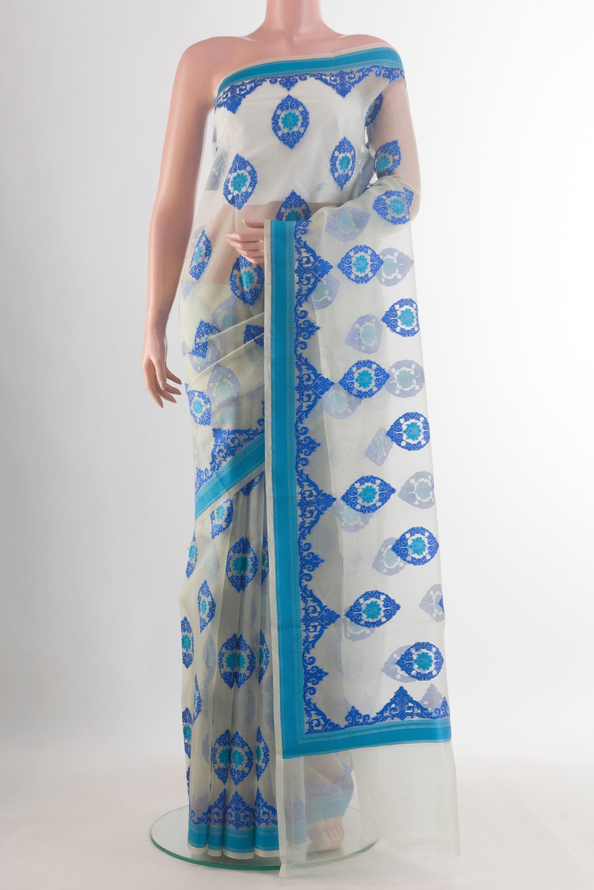 Pure Silk Off White Banarasi Kora Saree with Embroidered on the body and Thread Border.  displayed on a mannequin