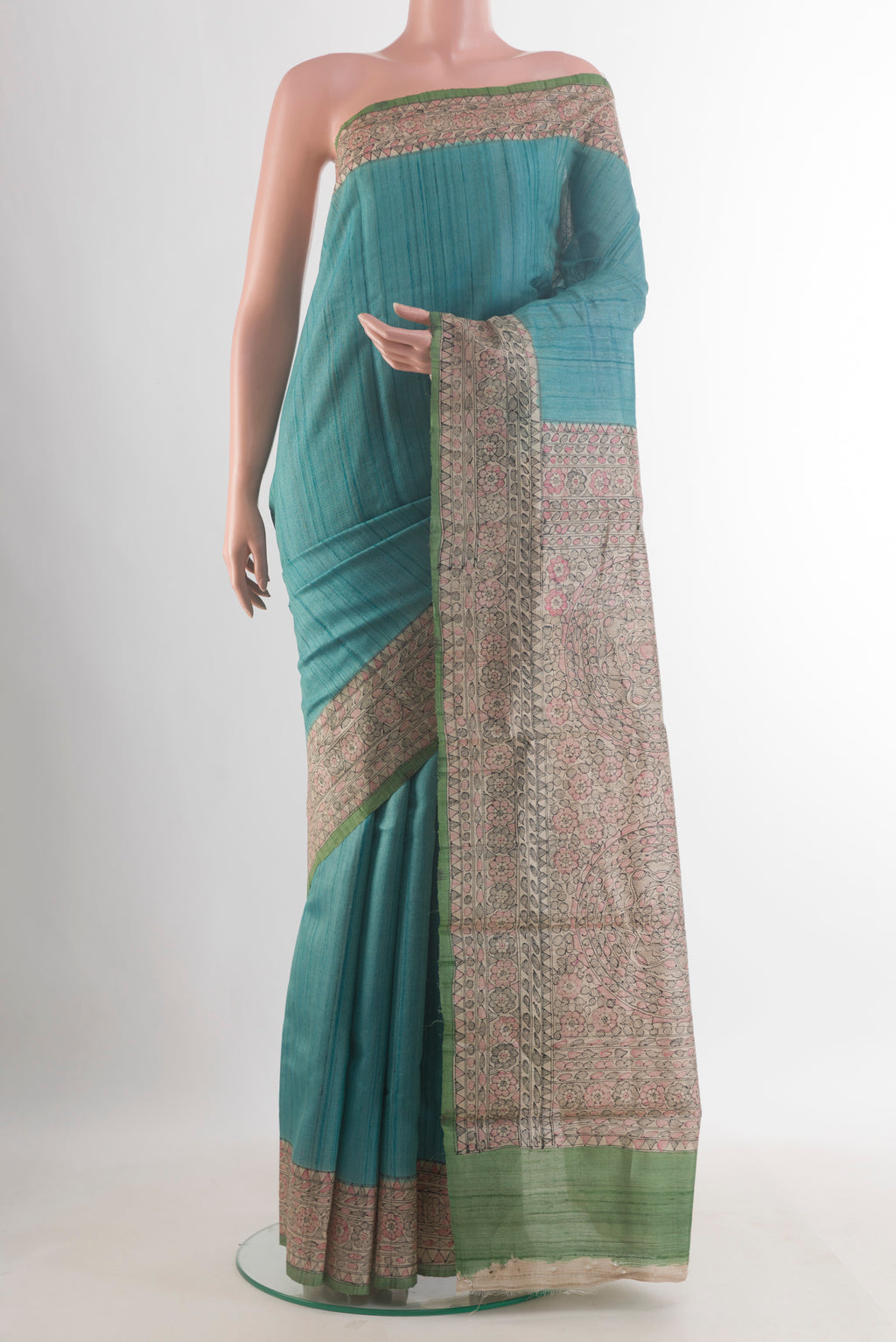Turquoise Tussar Saree with Plain Body and Printed Border.  displayed on a mannequin