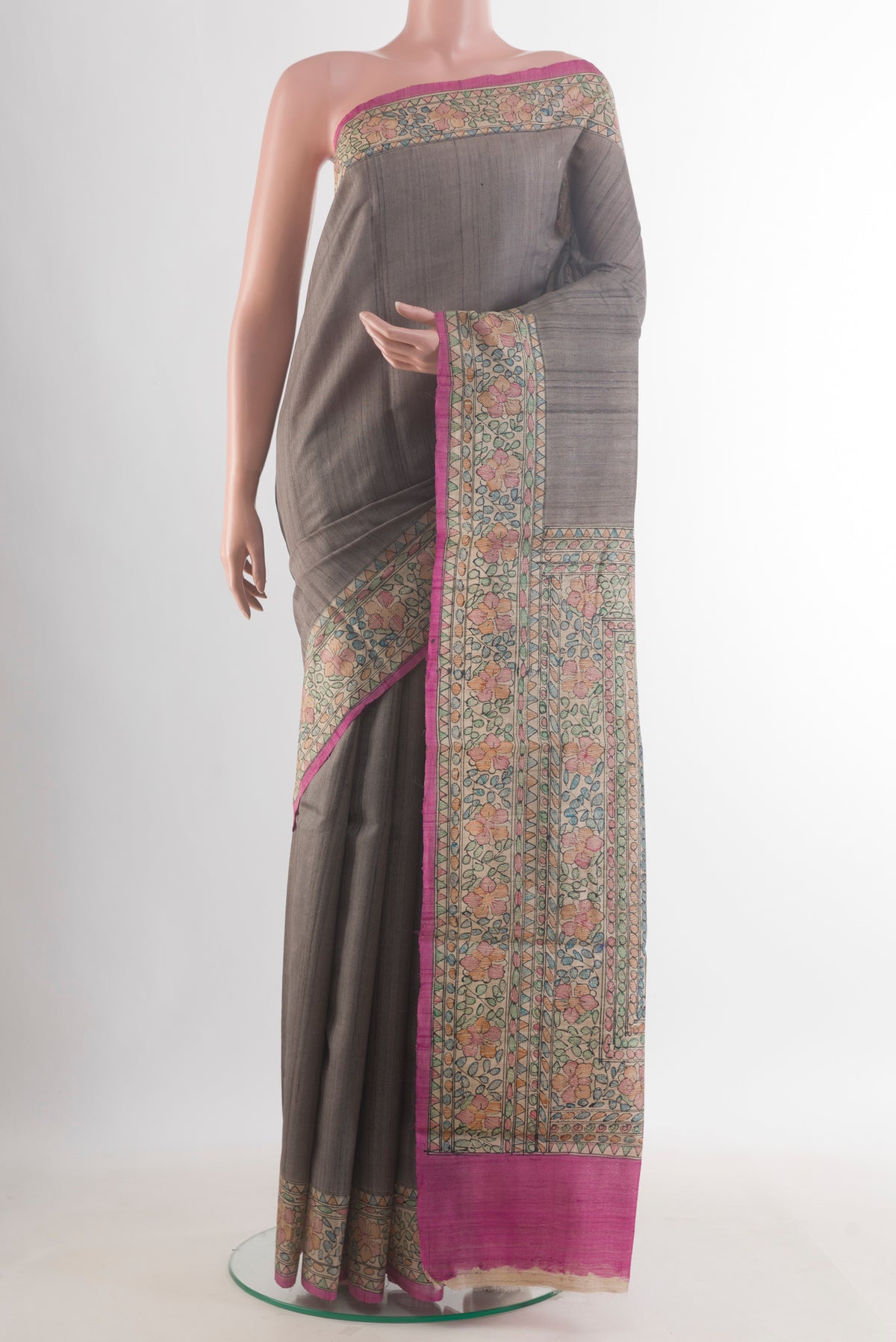 Grey Tussar Saree with Plain Body and Printed Border.  displayed on a mannequin