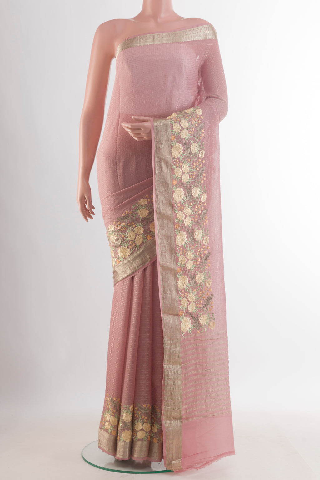 Rose Gold Mysore Georgette Saree with Checked design on the body and Embroidered Border.  displayed on a mannequin
