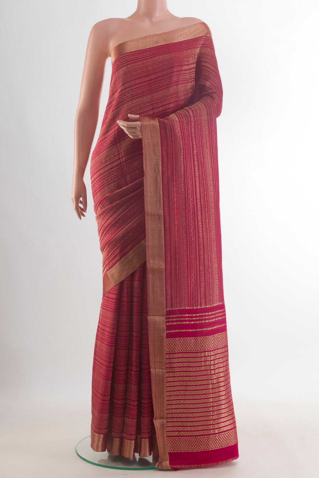 Deep Red Mysore Crepe Saree with Zari Brocade on the body and Zari Border.  displayed on a mannequin