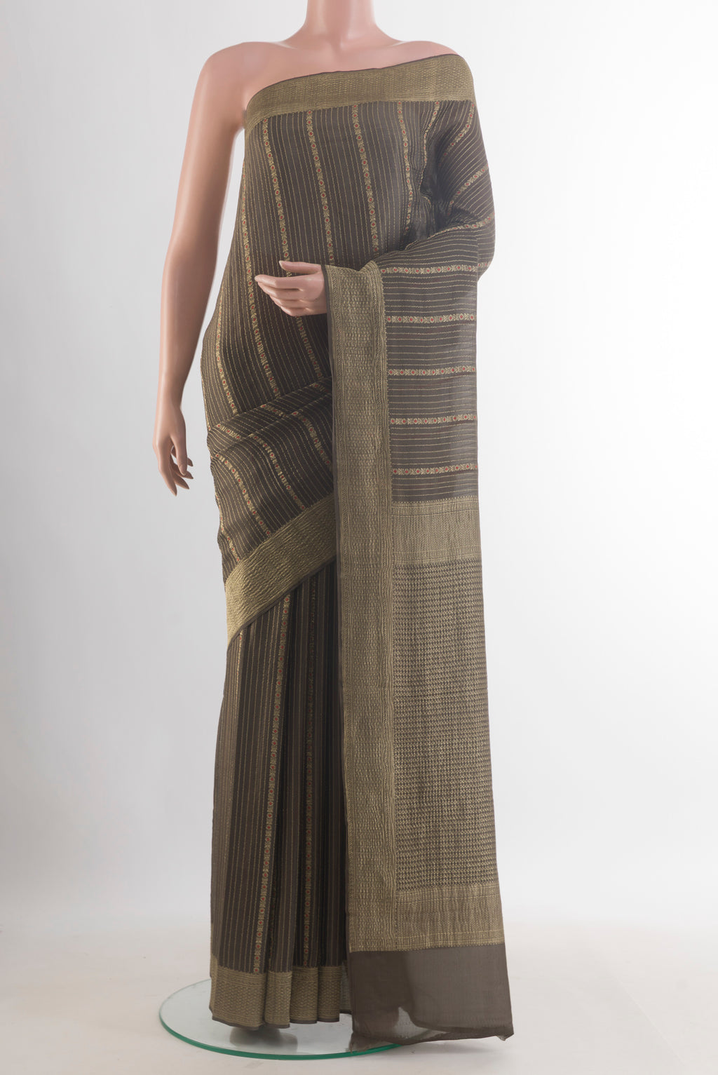 Davys Grey Mysore Crepe Saree with Stripes on the body and Zari Border.  displayed on a mannequin