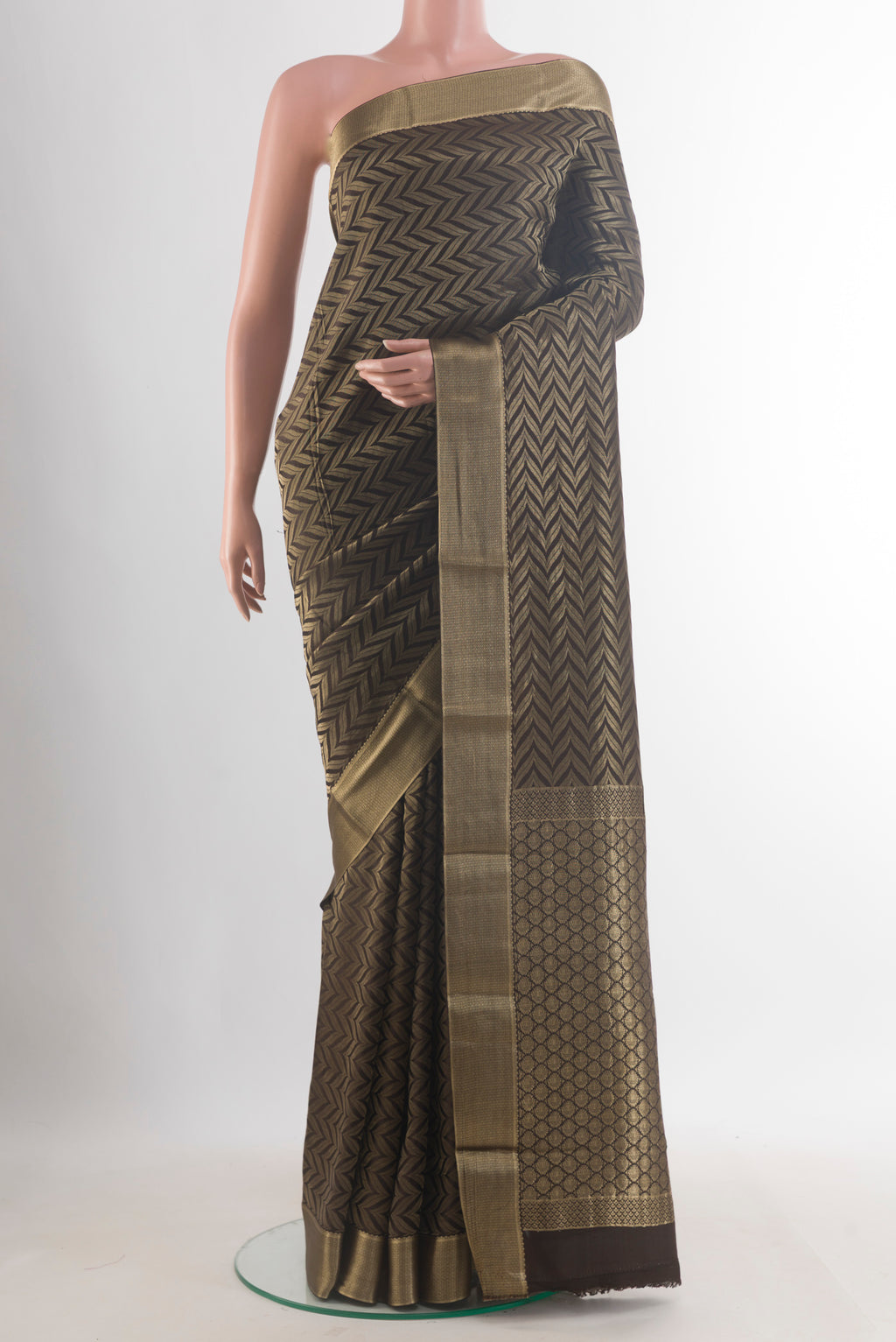 Brown Mysore Crepe Saree with Zari Brocade on the body and Zari Border.  displayed on a mannequin