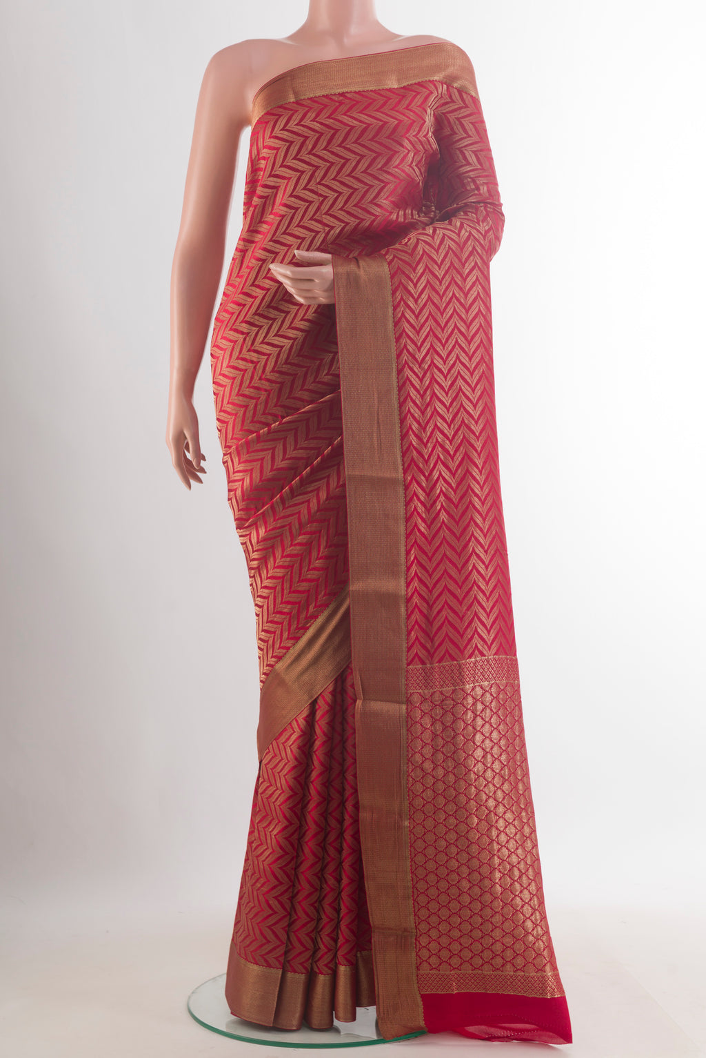 Red Mysore Crepe Saree with Zari Brocade on the body and Zari Border.  displayed on a mannequin