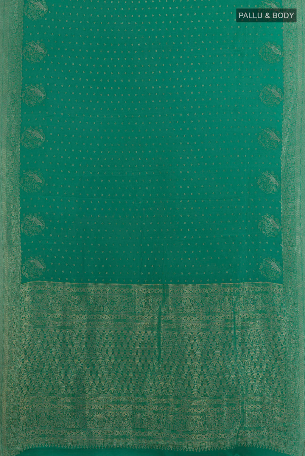 Flat view of Sea Green Mysore Crepe Saree with Zari Butta on the body and Zari Border. 