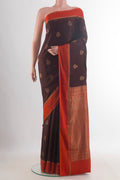 Brown Mysore Crepe Saree with Zari Butta on the body and Zari Border.  displayed on a mannequin