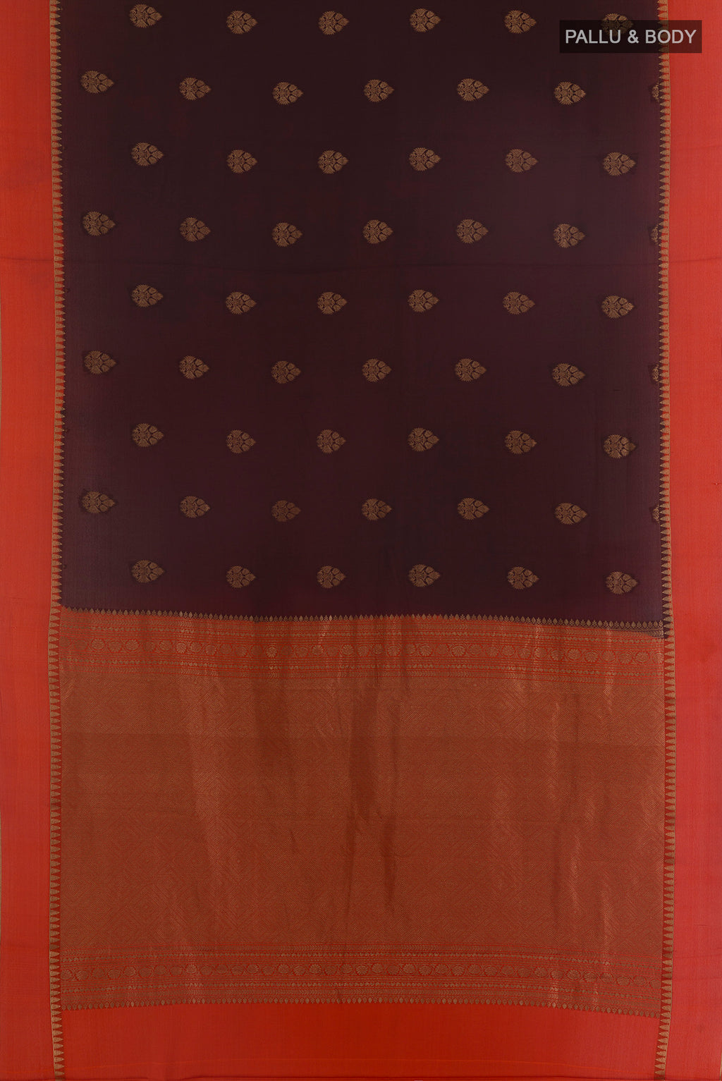 Flat view of Brown Mysore Crepe Saree with Zari Butta on the body and Zari Border. 