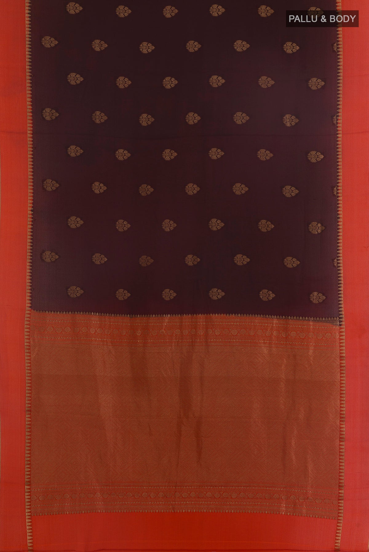 Flat view of Brown Mysore Crepe Saree with Zari Butta on the body and Zari Border. 