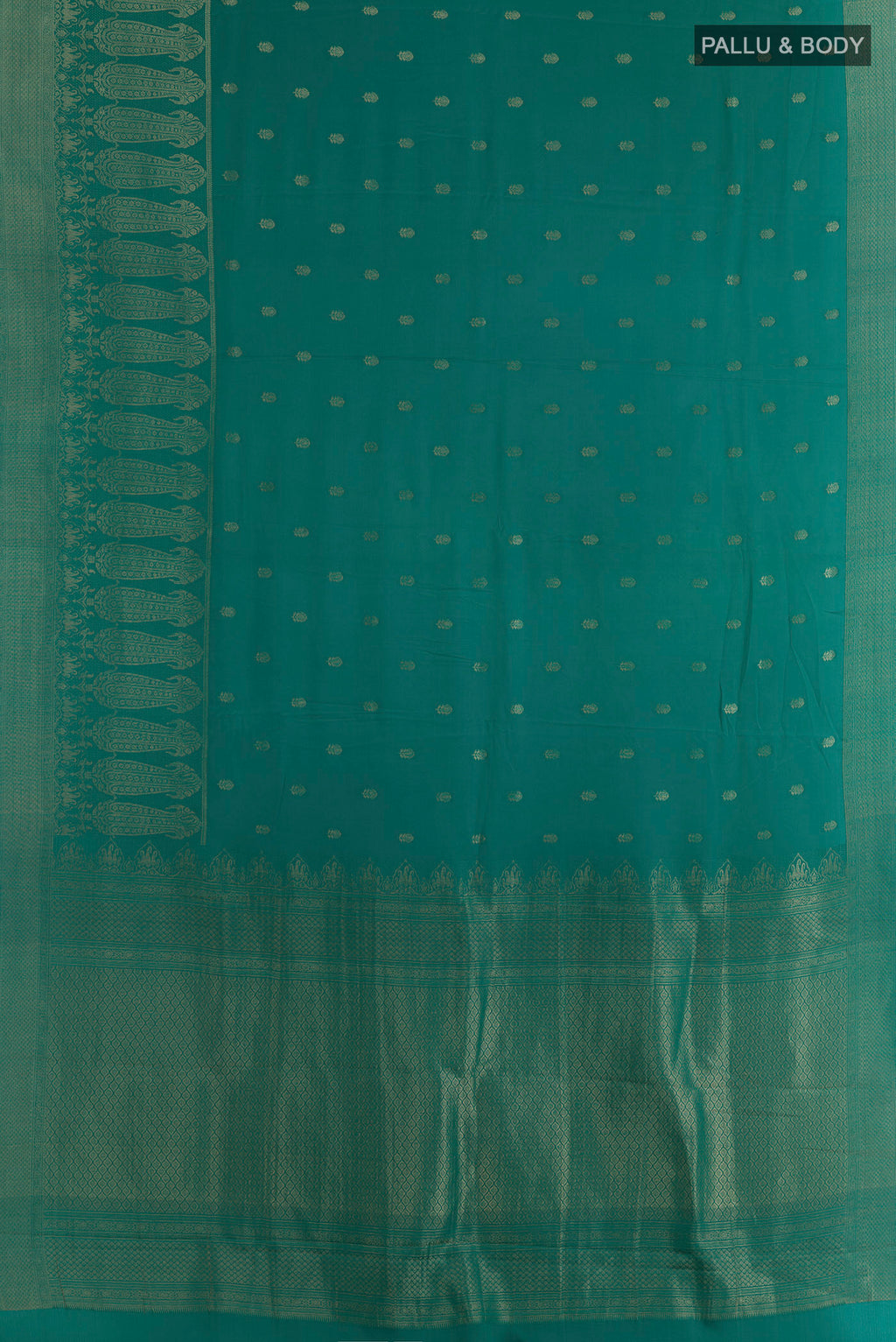 Flat view of Sea Green Mysore Crepe Saree with Zari Butta on the body and Zari Border. 