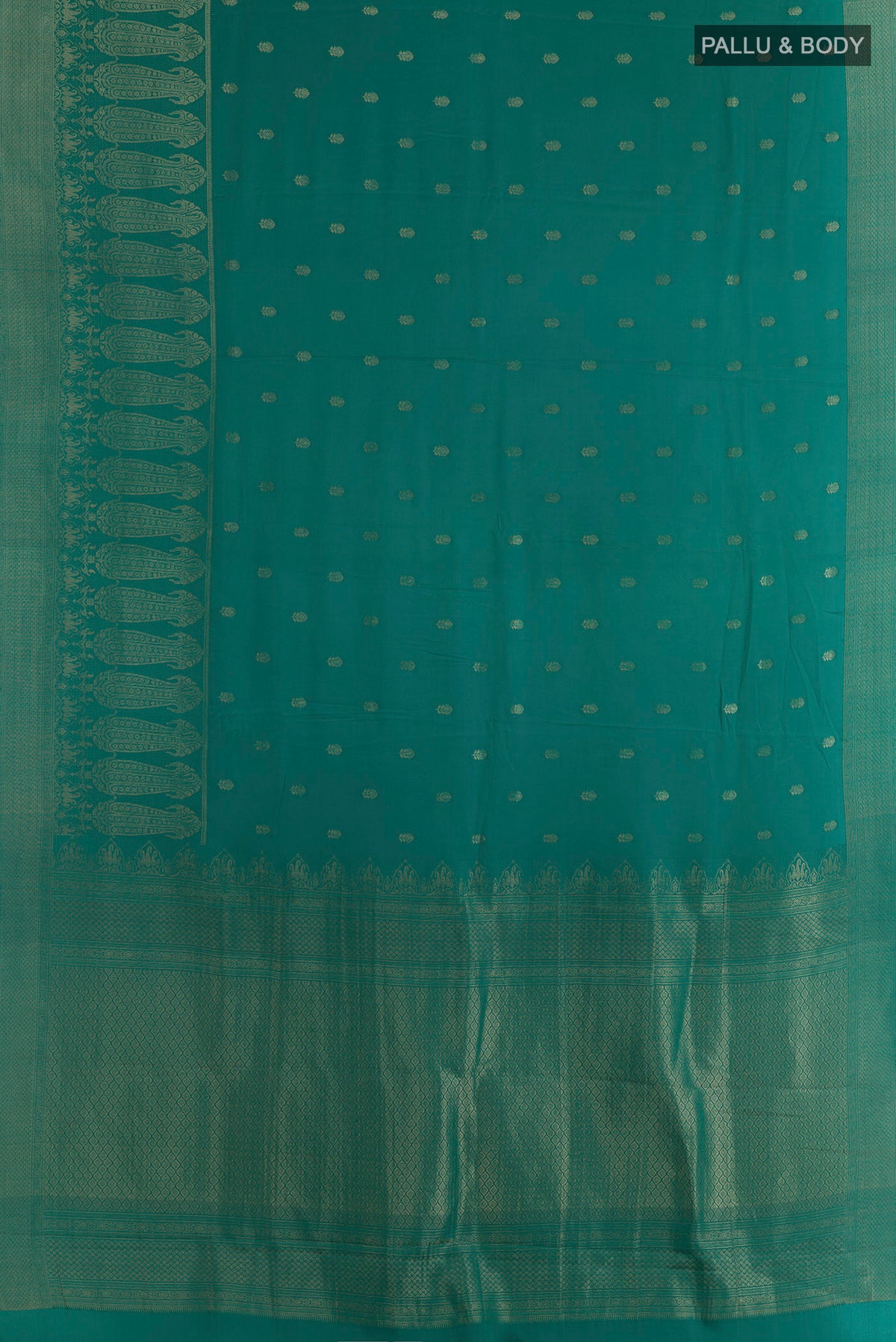 Flat view of Sea Green Mysore Crepe Saree with Zari Butta on the body and Zari Border. 