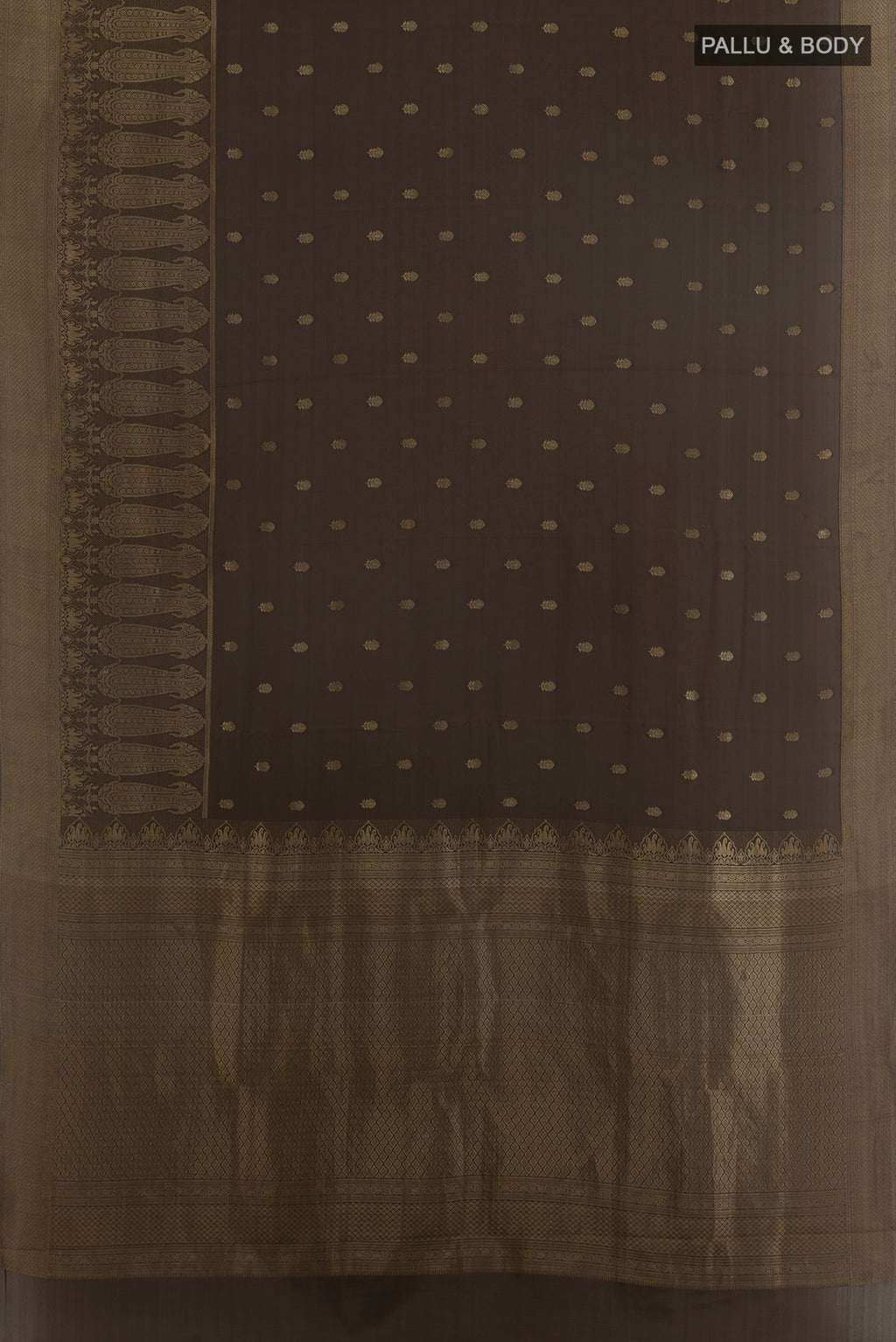 Flat view of Mehandi Green Mysore Crepe Saree with Zari Butta on the body and Zari Border. 