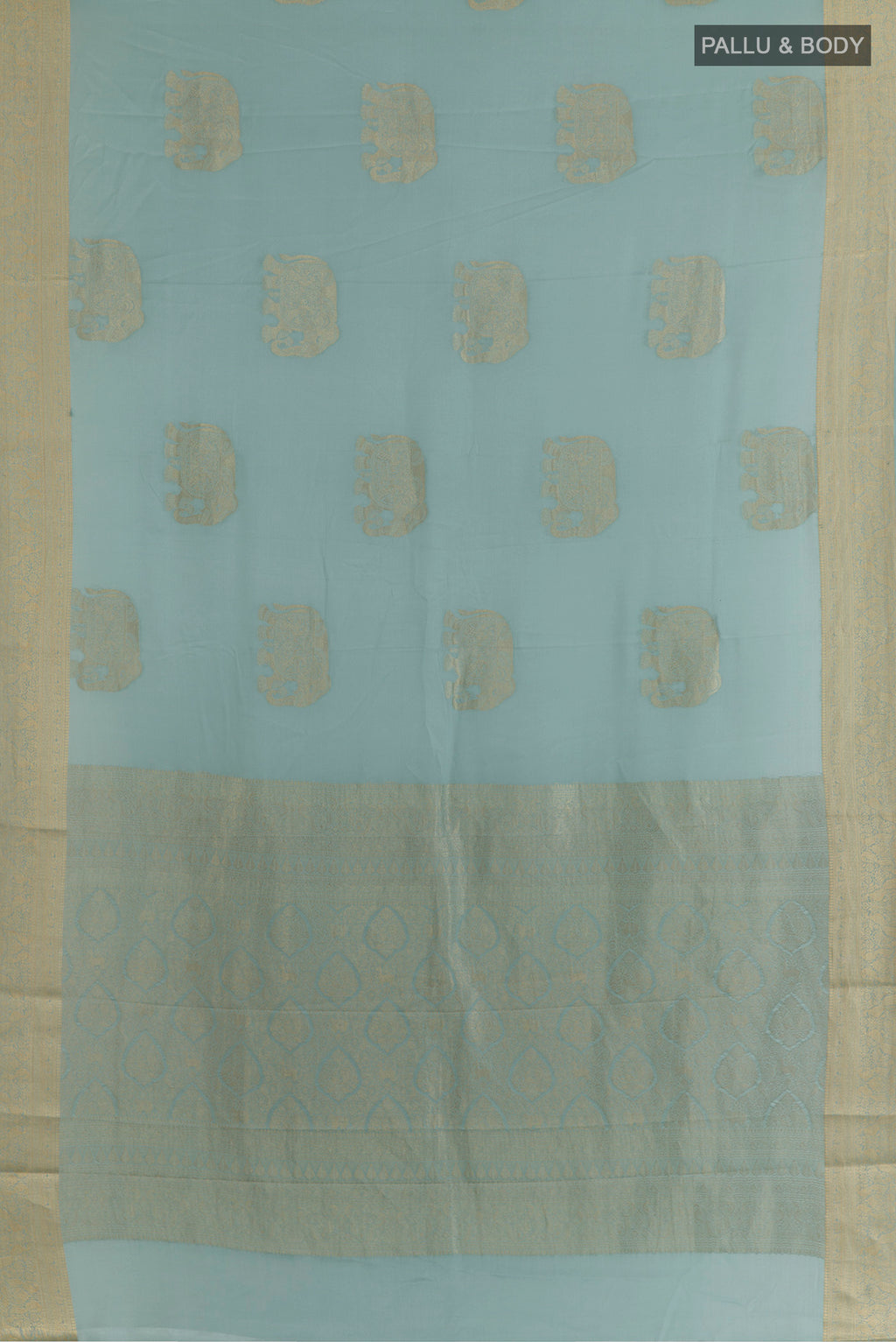 Flat view of Light Blue Mysore Crepe Saree with Zari Butta on the body and Zari Border. 