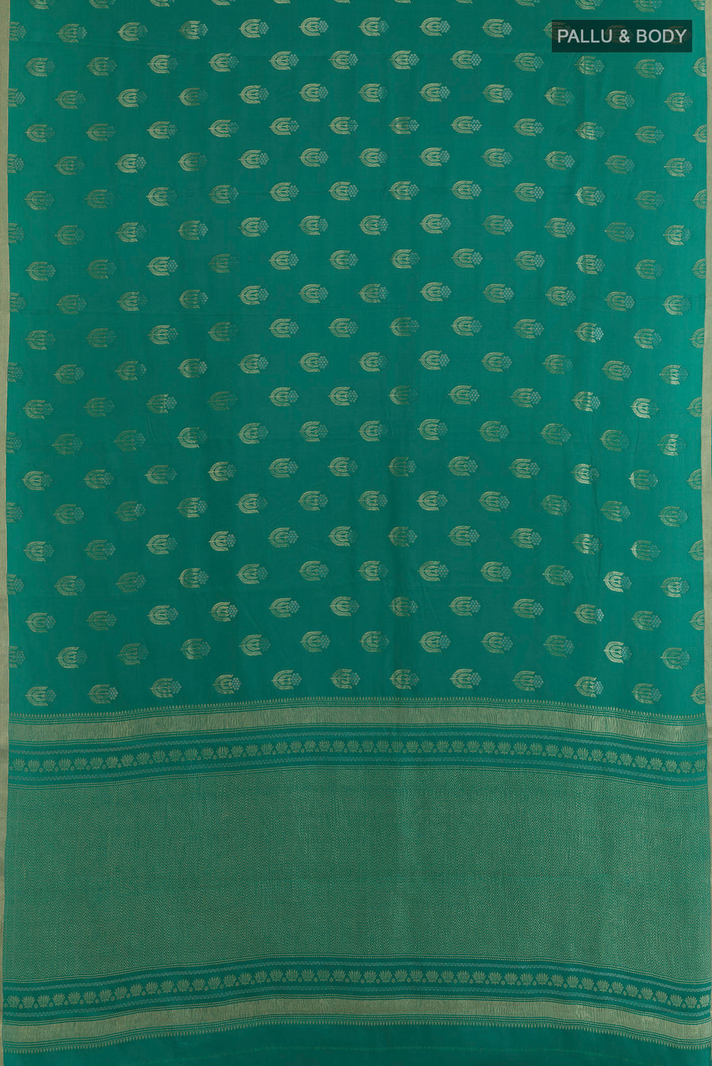 Flat view of Sea Green Mysore Crepe Saree with Zari Butta on the body and Zari Border. 