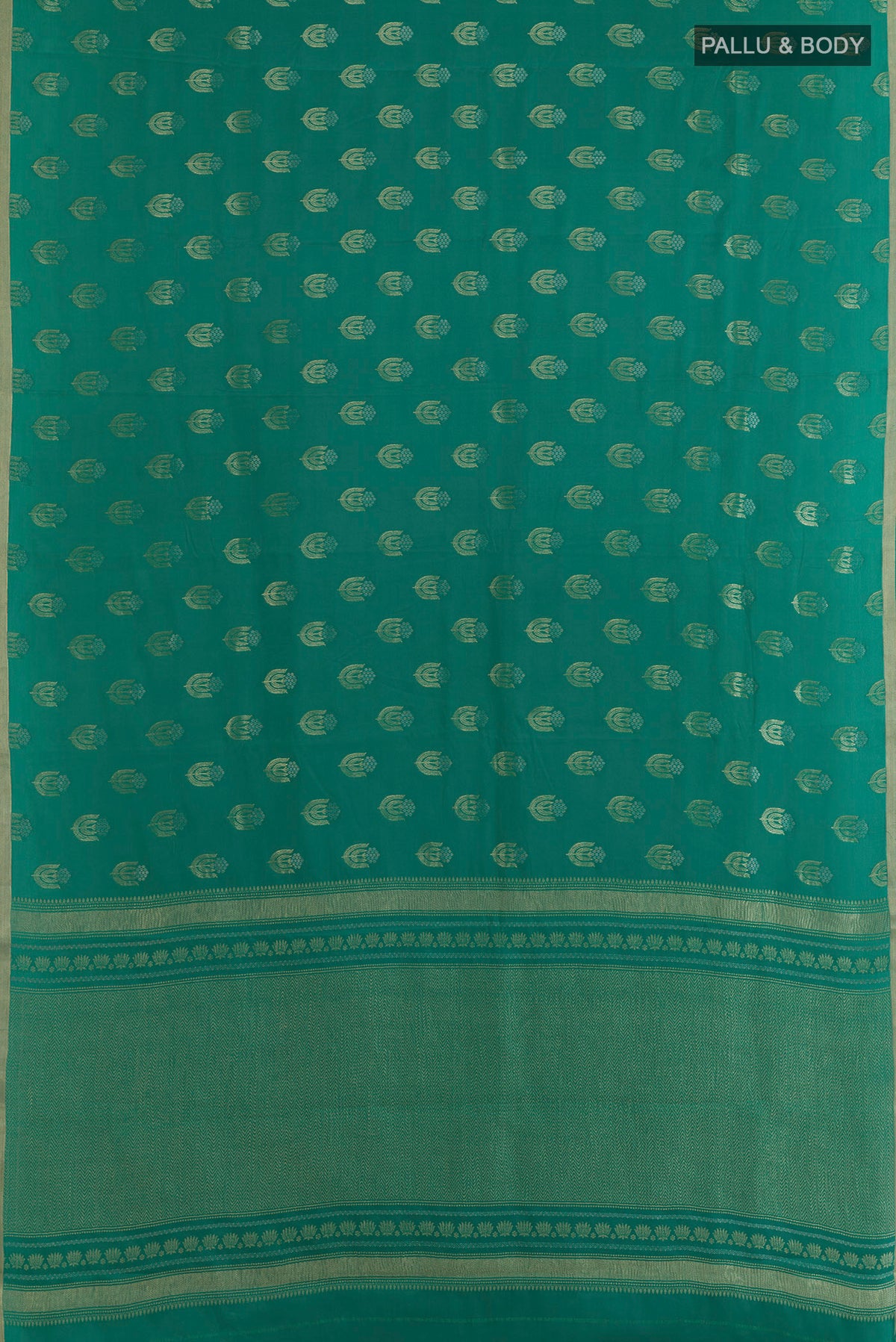 Flat view of Sea Green Mysore Crepe Saree with Zari Butta on the body and Zari Border. 