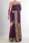 Purple Mysore Crepe Saree with Zari Butta on the body and Zari Border.  displayed on a mannequin