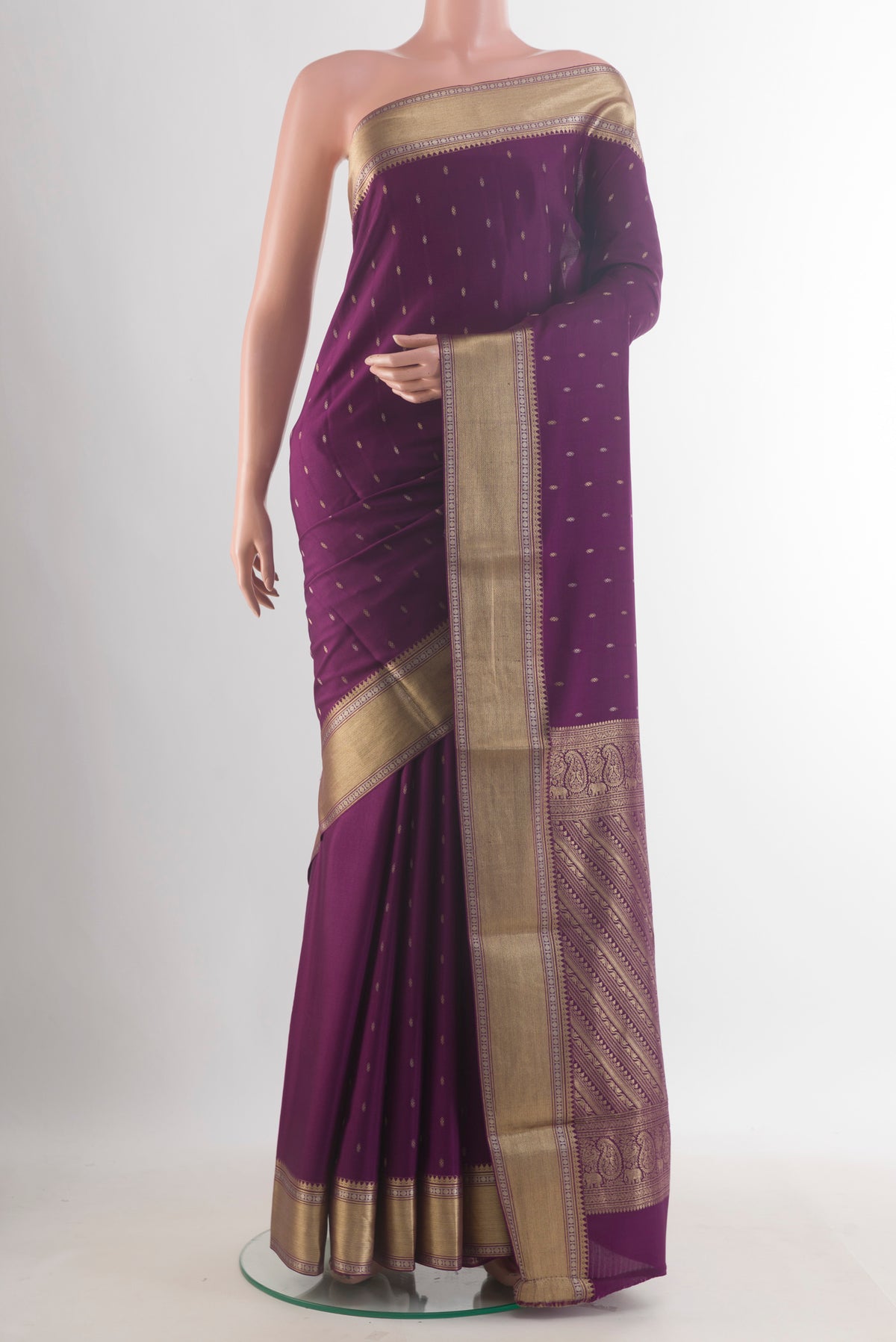 Purple Mysore Crepe Saree with Zari Butta on the body and Zari Border.  displayed on a mannequin