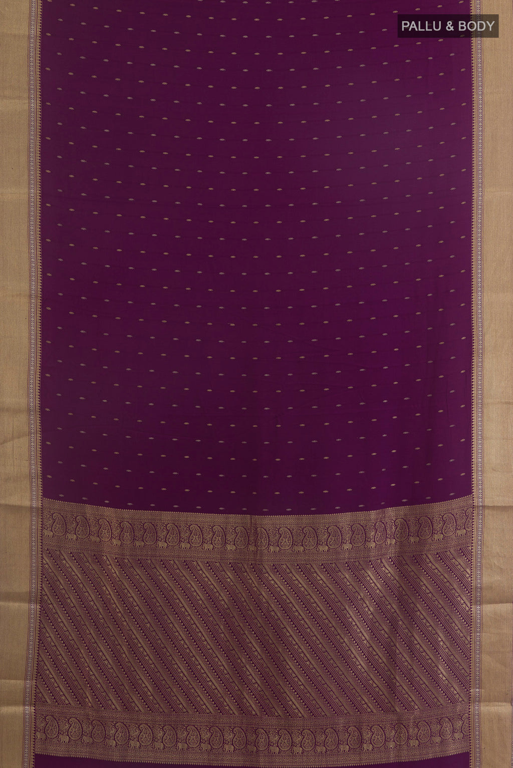 Flat view of Purple Mysore Crepe Saree with Zari Butta on the body and Zari Border. 