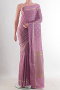 Lavender Mysore Crepe Saree with Zari Butta on the body and Zari Border.  displayed on a mannequin