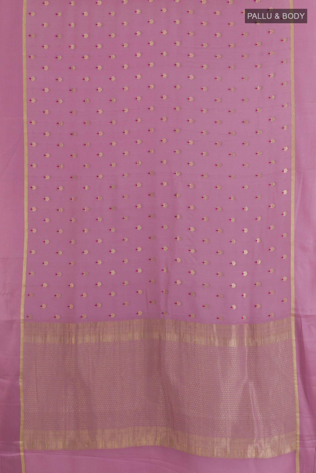 Flat view of Lavender Mysore Crepe Saree with Zari Butta on the body and Zari Border. 
