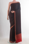 Brown Mysore Crepe Saree with Plain Body and Zari Border.  displayed on a mannequin