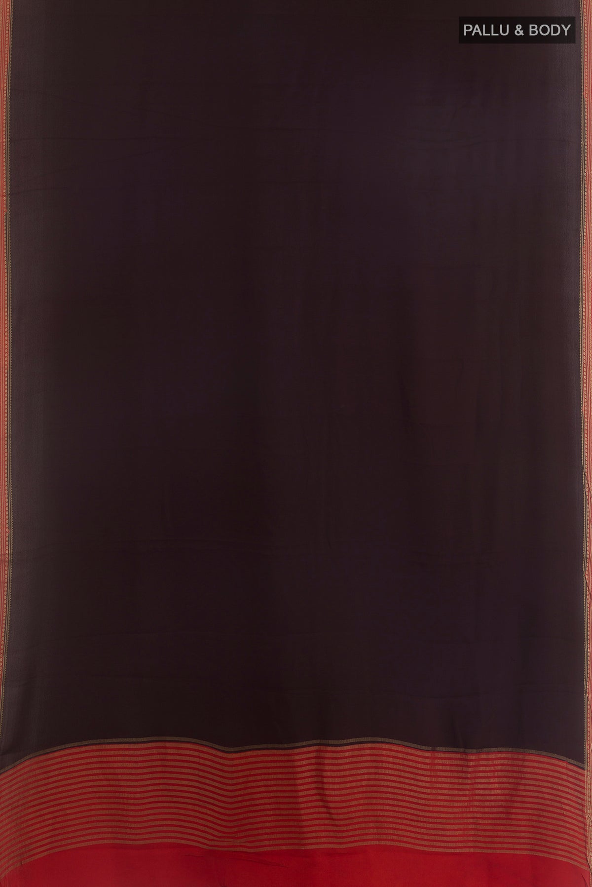Flat view of Brown Mysore Crepe Saree with Plain Body and Zari Border. 