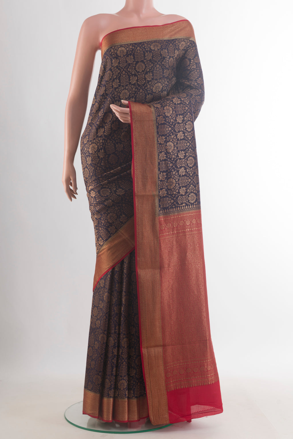 Navy Blue Mysore Crepe Saree with Zari Brocade on the body and Zari Border.  displayed on a mannequin
