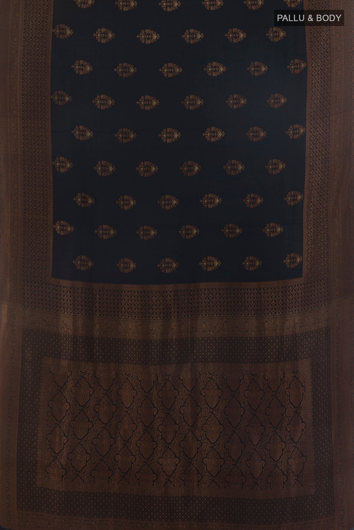 Flat view of Black Mysore Crepe Saree with Zari Butta on the body and Zari Border. 