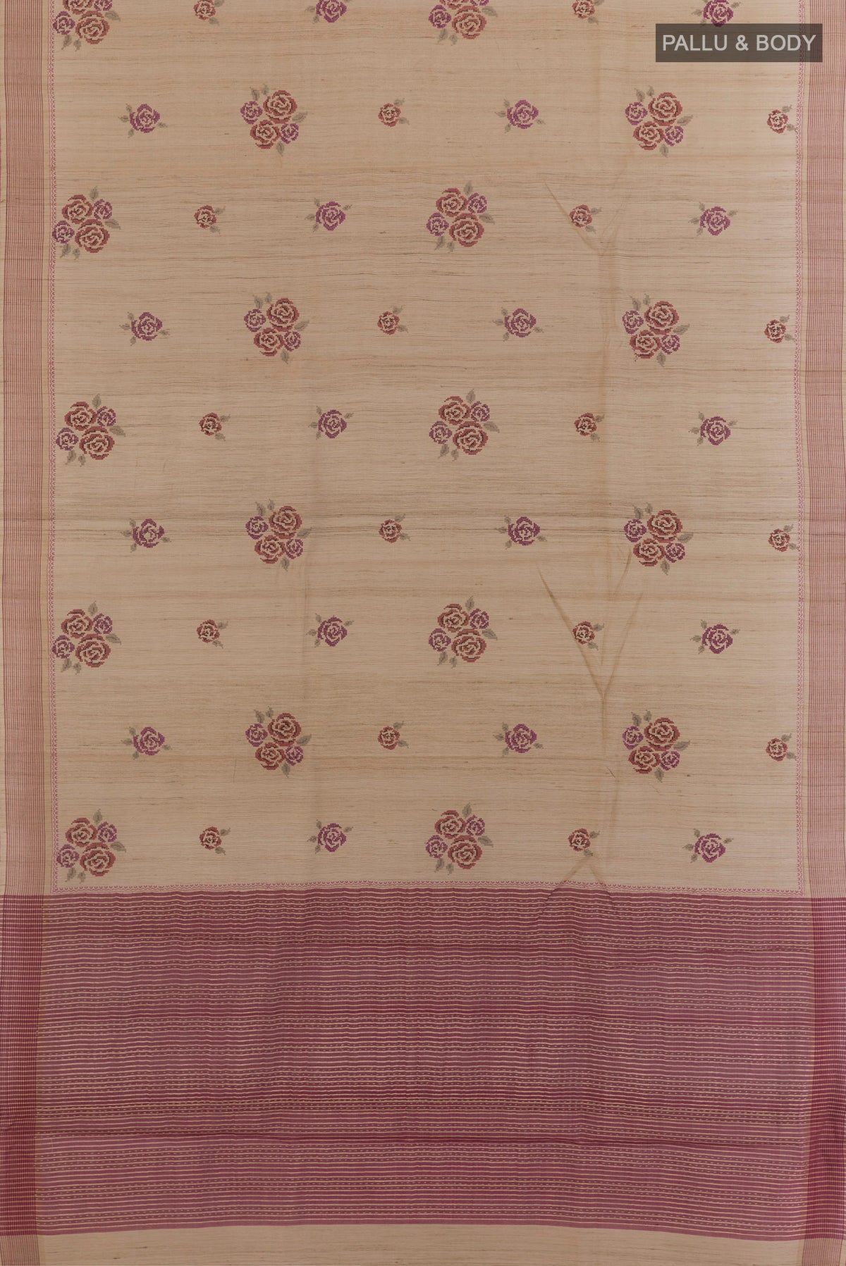 Flat view of Beige Tussar Saree with Embroidered on the body and Zari Border. 