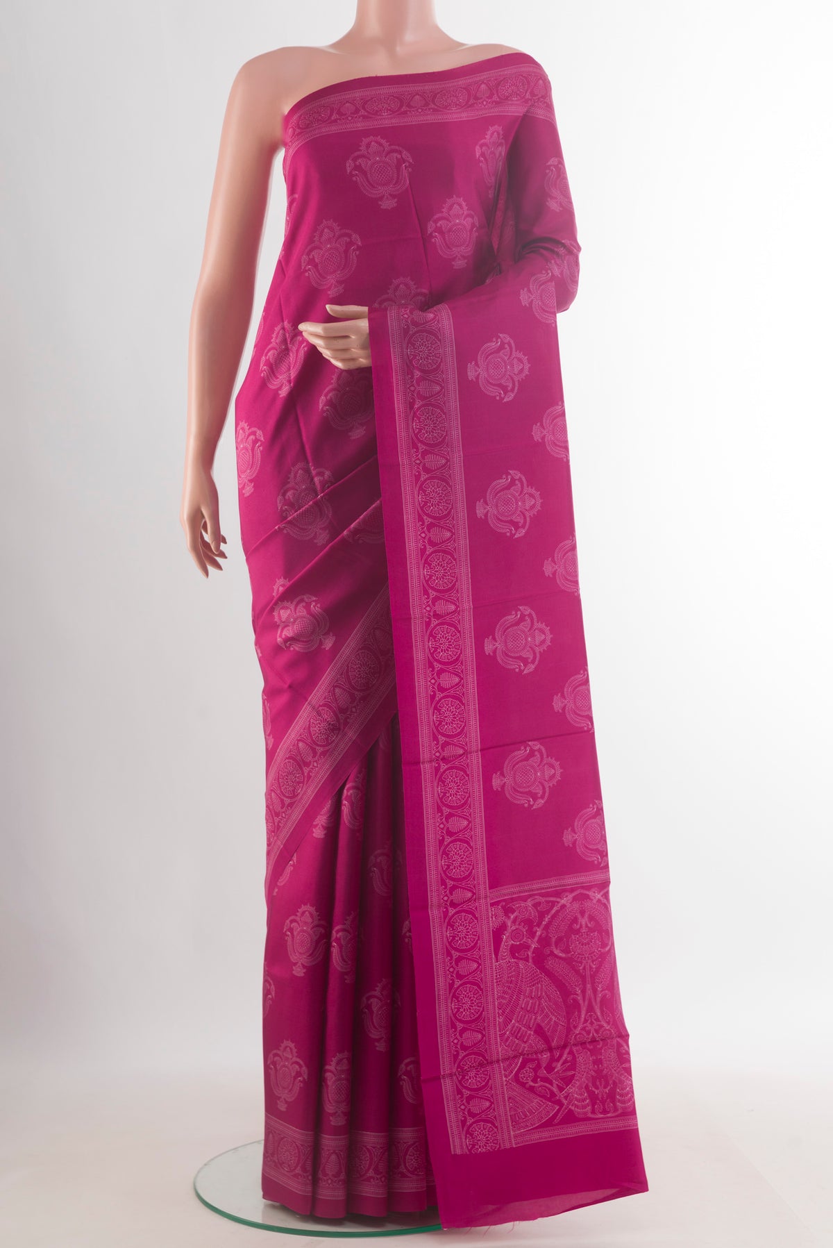 Pure Silk Pink Printed Saree with Printed design on the body and Printed Border.  displayed on a mannequin