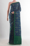 Pure Silk Navy Blue Printed Saree with Printed design on the body and Plain Border.  displayed on a mannequin