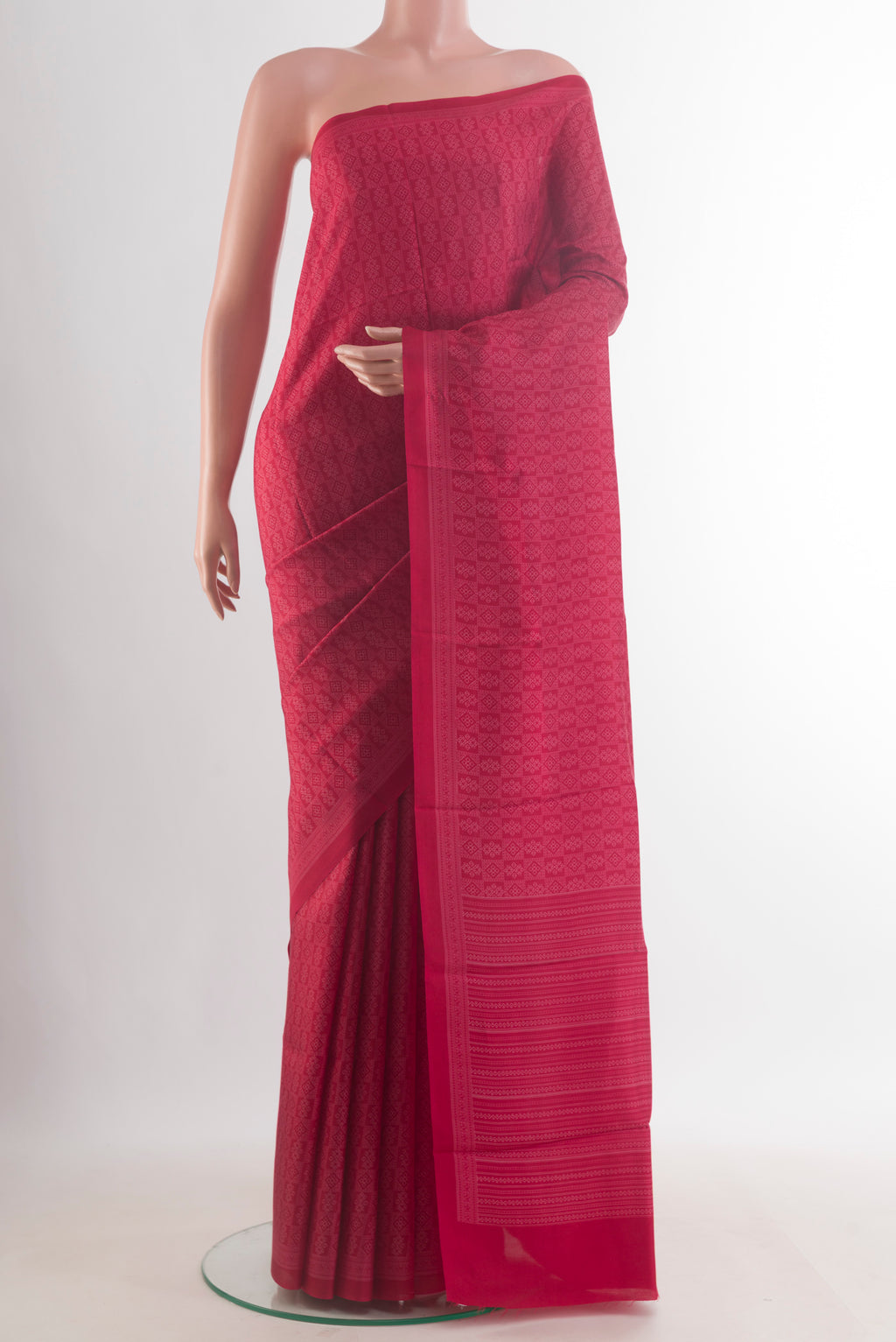 Pure Silk Deep Red Printed Saree with Printed design on the body and Printed Border.  displayed on a mannequin