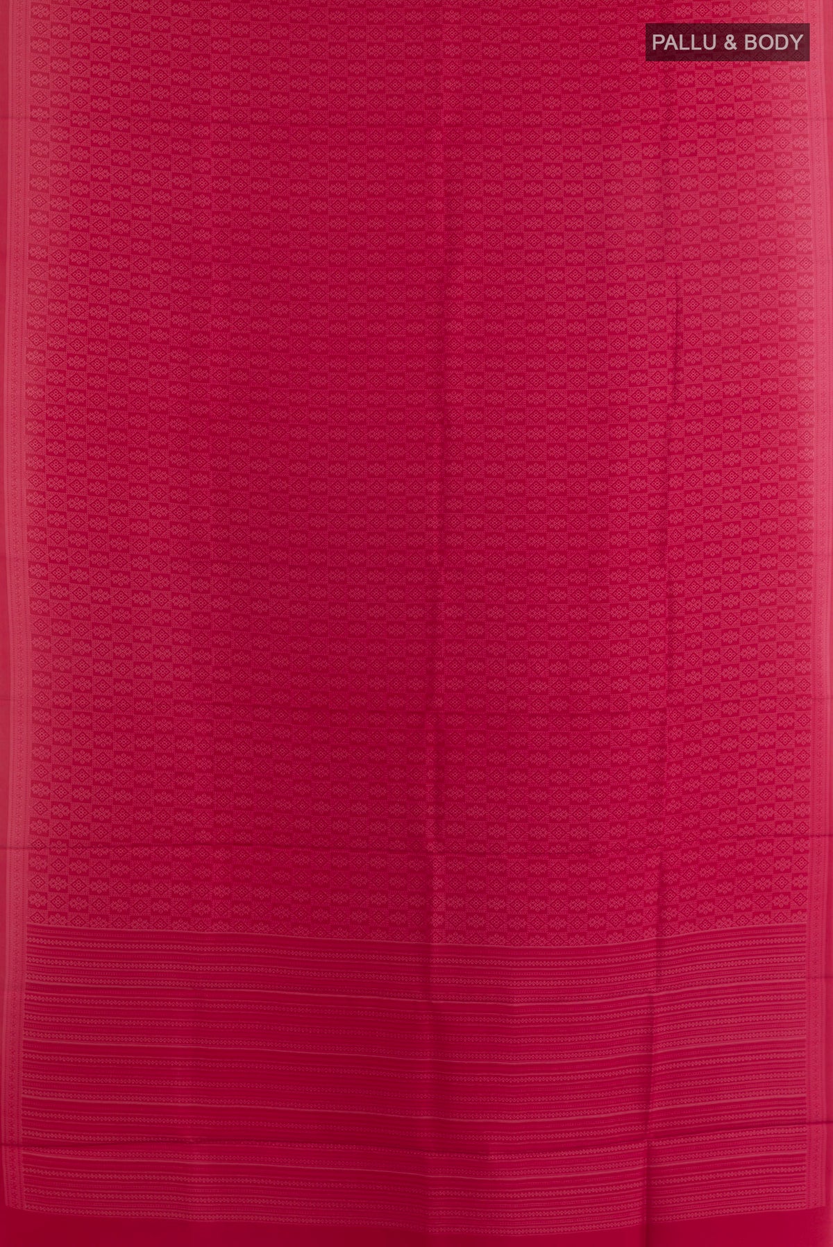 Flat view of Pure Silk Deep Red Printed Saree with Printed design on the body and Printed Border. 