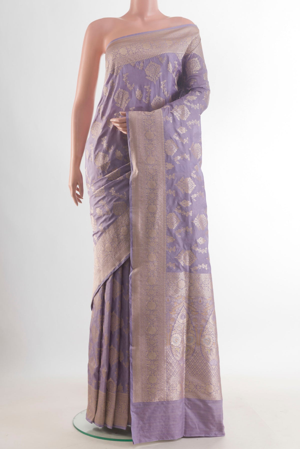 Pure Silk Lavender Banarasi Saree with Zari Brocade on the body and Zari Border.  displayed on a mannequin