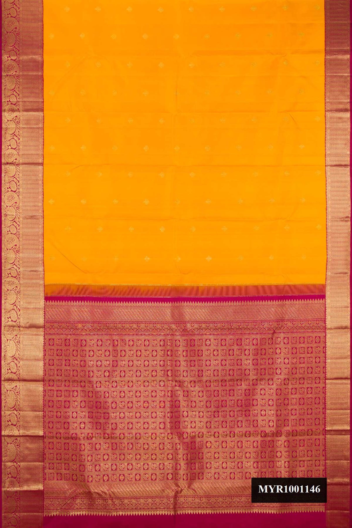 Mustard Dual Tone Kanchipuram Silk Saree with Zari Butta on the body and Zari Border.  displayed on a mannequin