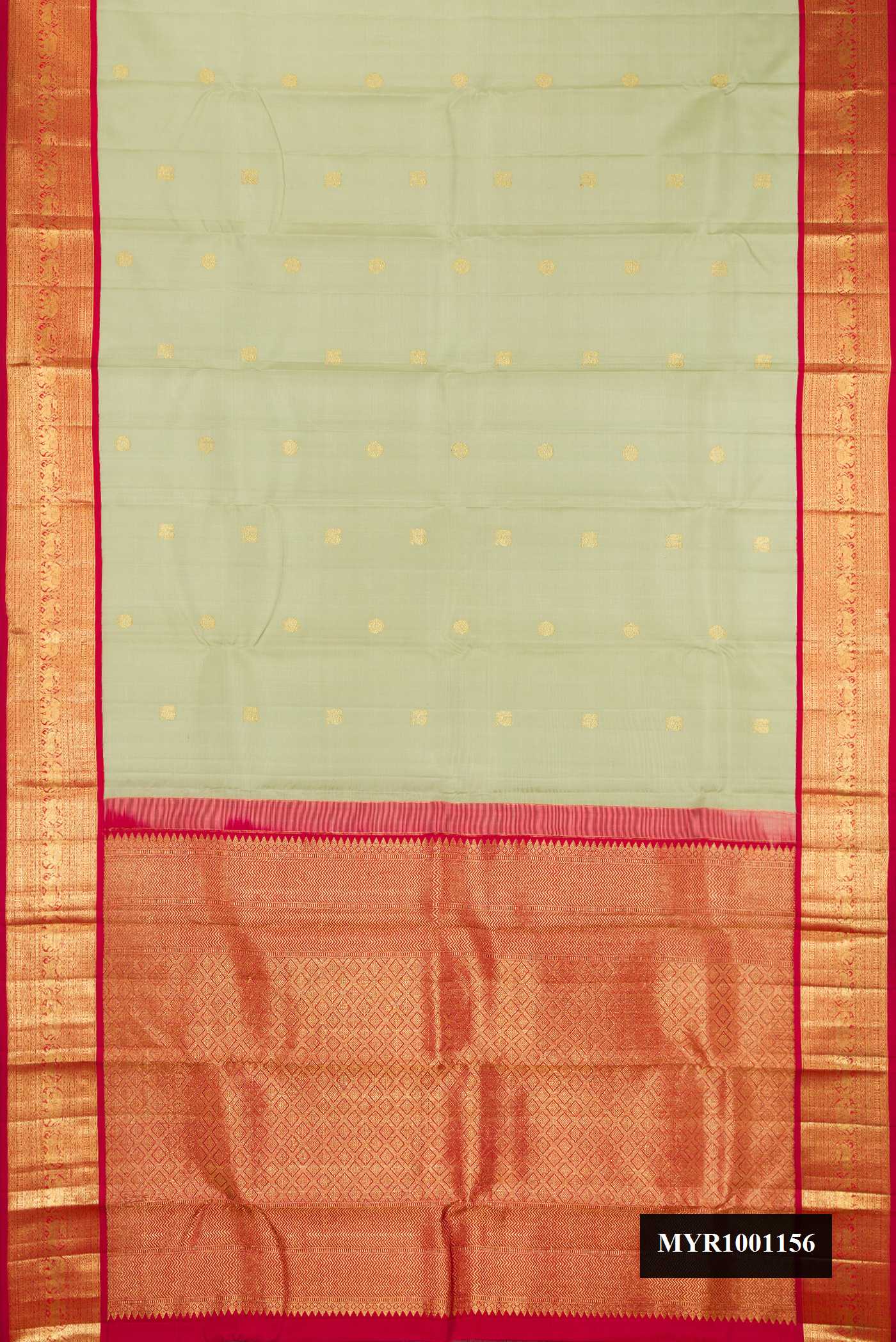 Pista Green Dual Tone Kanchipuram Silk Saree with Zari Butta on the body and Zari Border.  displayed on a mannequin