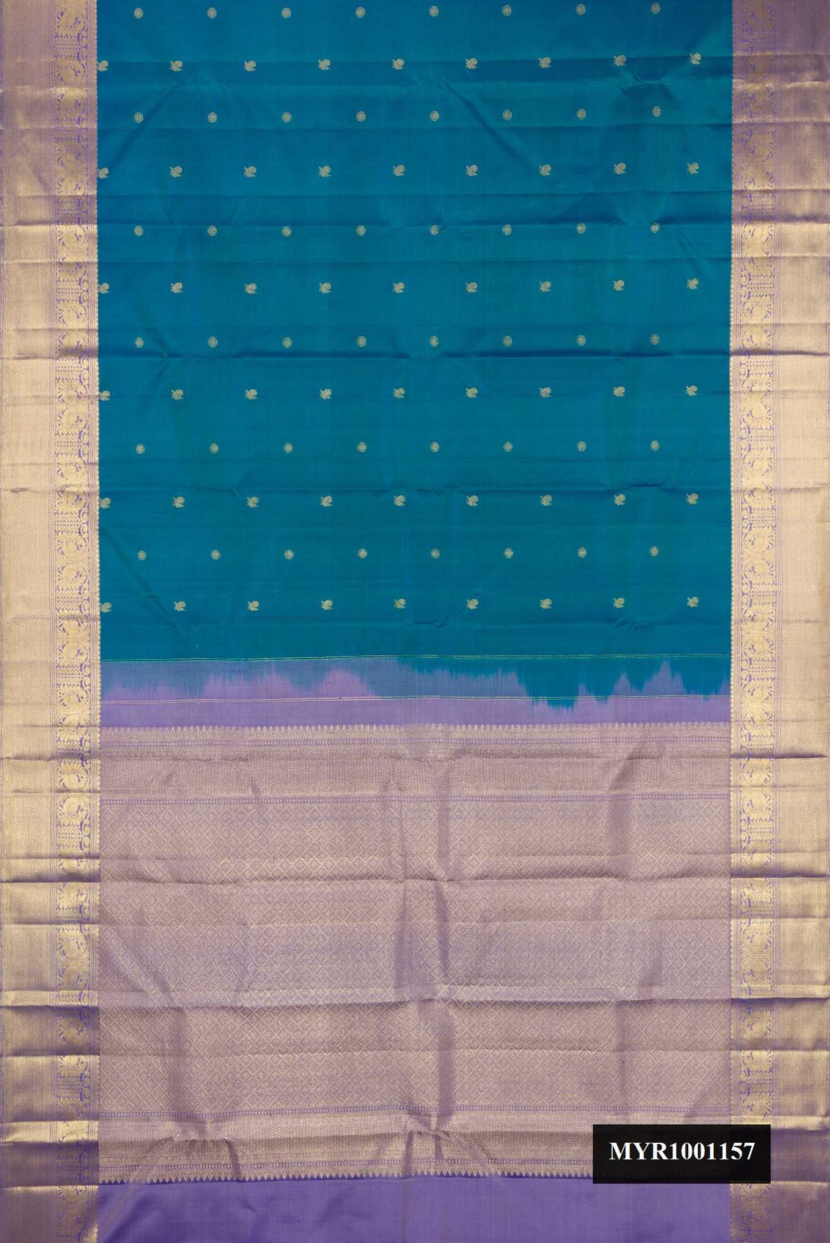 Peacock Blue Dual Tone Kanchipuram Silk Saree with Zari Butta on the body and Zari Border.  displayed on a mannequin