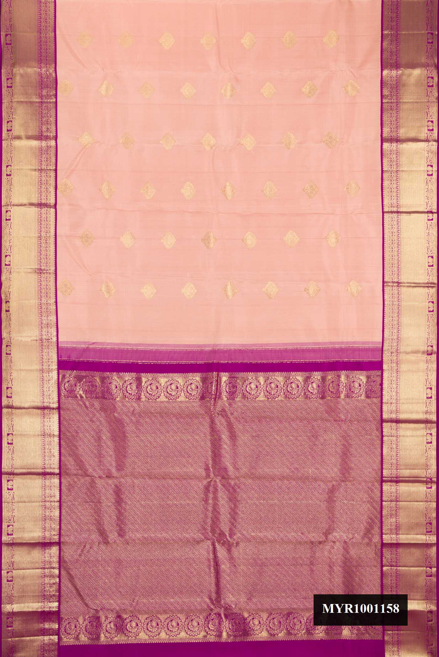 Golden Peach Dual Tone Kanchipuram Silk Saree with Zari Butta on the body and Zari Border.  displayed on a mannequin