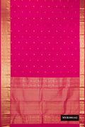 Dark Pink Dual Tone Kanchipuram Silk Saree with Zari Butta on the body and Zari Border.  displayed on a mannequin