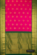 Dark Pink Dual Tone Kanchipuram Silk Saree with Zari Butta on the body and Zari Border.  displayed on a mannequin