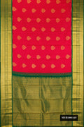 Red Dual Tone Kanchipuram Silk Saree with Zari Butta on the body and Zari Border.  displayed on a mannequin
